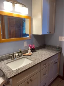 Bathroom renovation with new cabinets and countertops